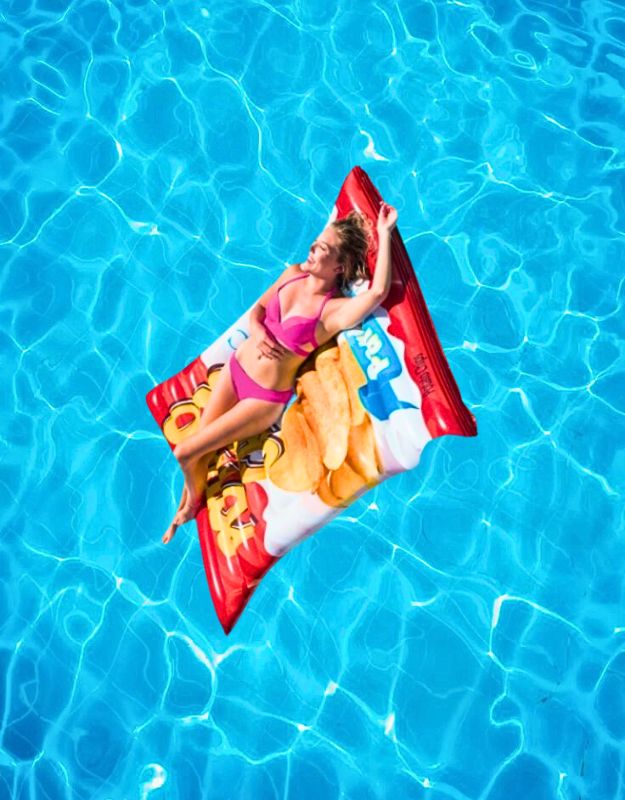 Woman relaxing on the Intex 58776EU Potato Chips Float in a swimming pool